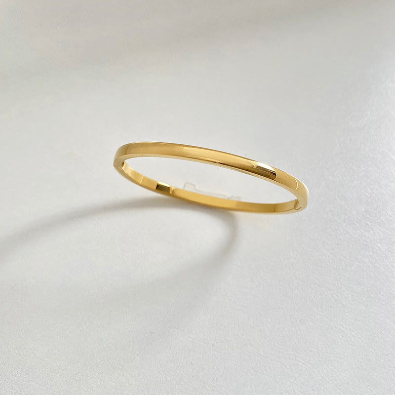 Minimalist Gold‑Plated Stainless Steel Bangle Bracelet
