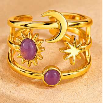 18K gold plated stainless steel open ring with sun, moon and star details and purple resin accent stones.