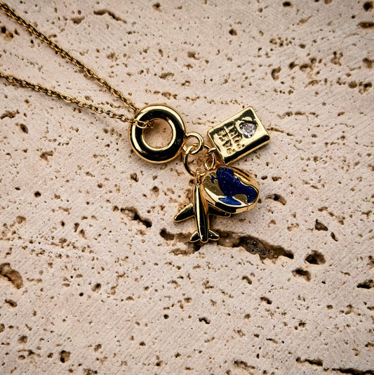 Wanderlust Charm Necklace – Gold‑Plated Plane, Globe & Passport Pendants