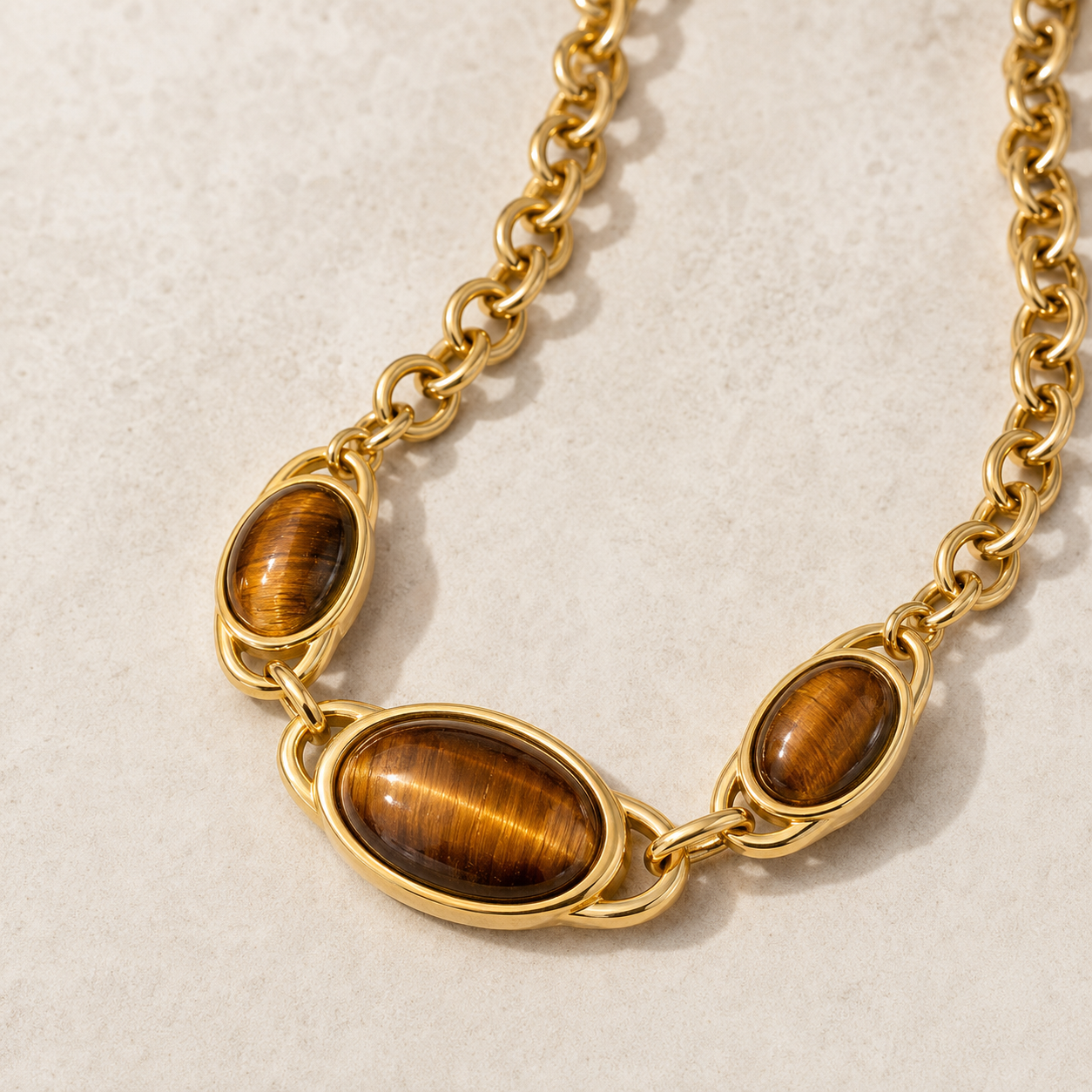 Tiger eye stone chain necklace with three oval natural stones in 18K gold plated stainless steel cable chain, by Sialen Rosad London