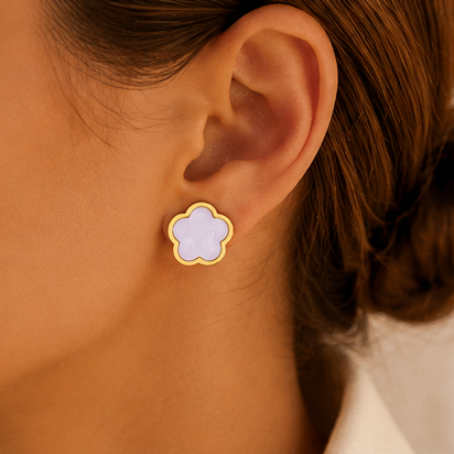White clover shell stud earrings with 18K gold plated stainless steel frame and smooth floral four-leaf design.