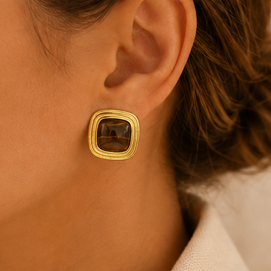 Tiger eye square stud earrings with 18K gold plated stainless steel frame, layered gold edging and glossy brown geometric centre.
