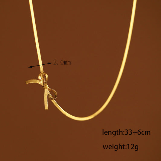 Golden Ribbon Bow Necklace – Graceful Simplicity