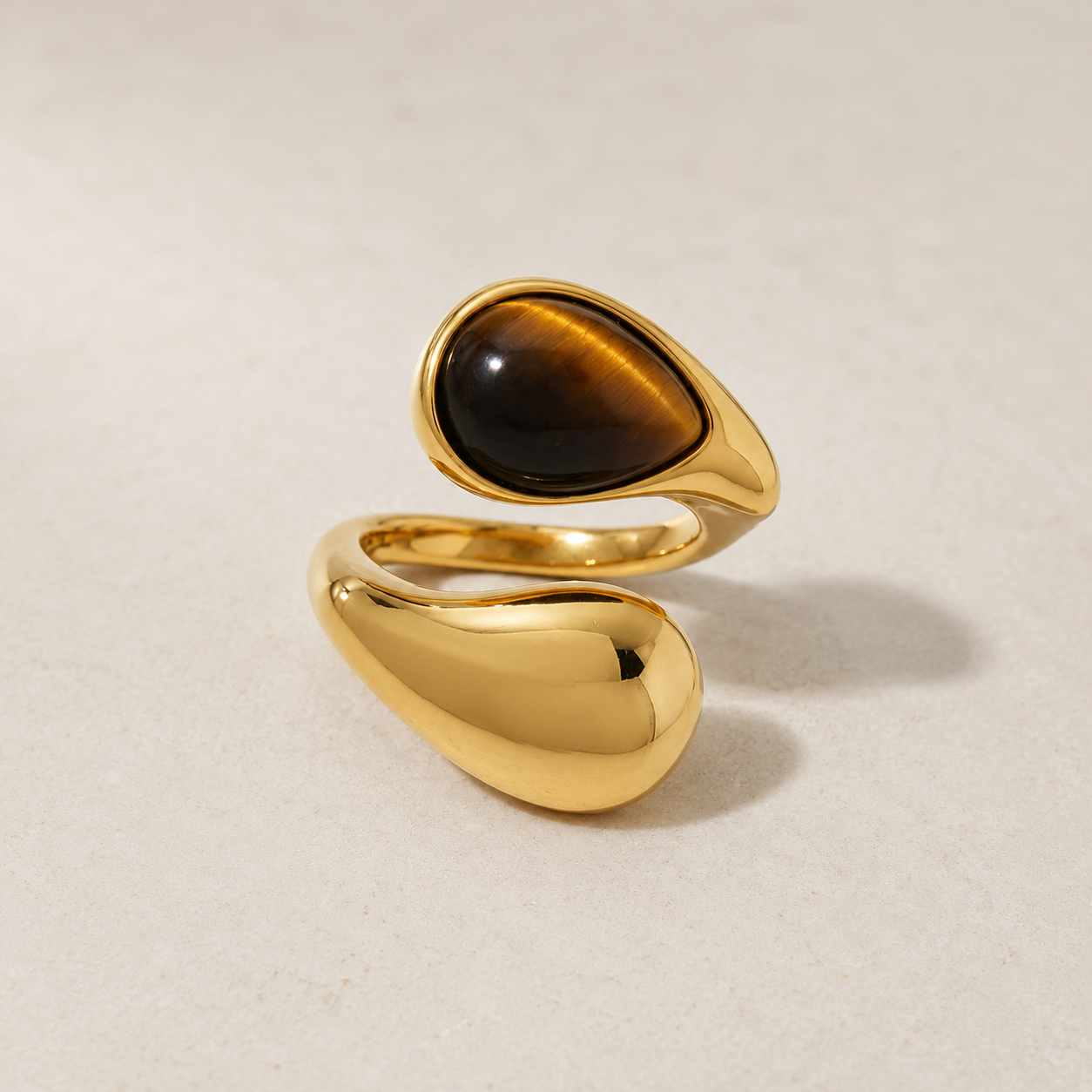 Tiger Eye Teardrop Wrap Ring with natural stone cabochon and polished gold dome in 18K gold plated stainless steel, by Sialen Rosad London