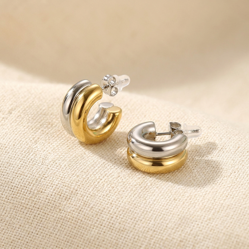 Chunky C-Shape Hoop Earrings two-tone gold and silver in 18K gold plated stainless steel by Sialen Rosad London